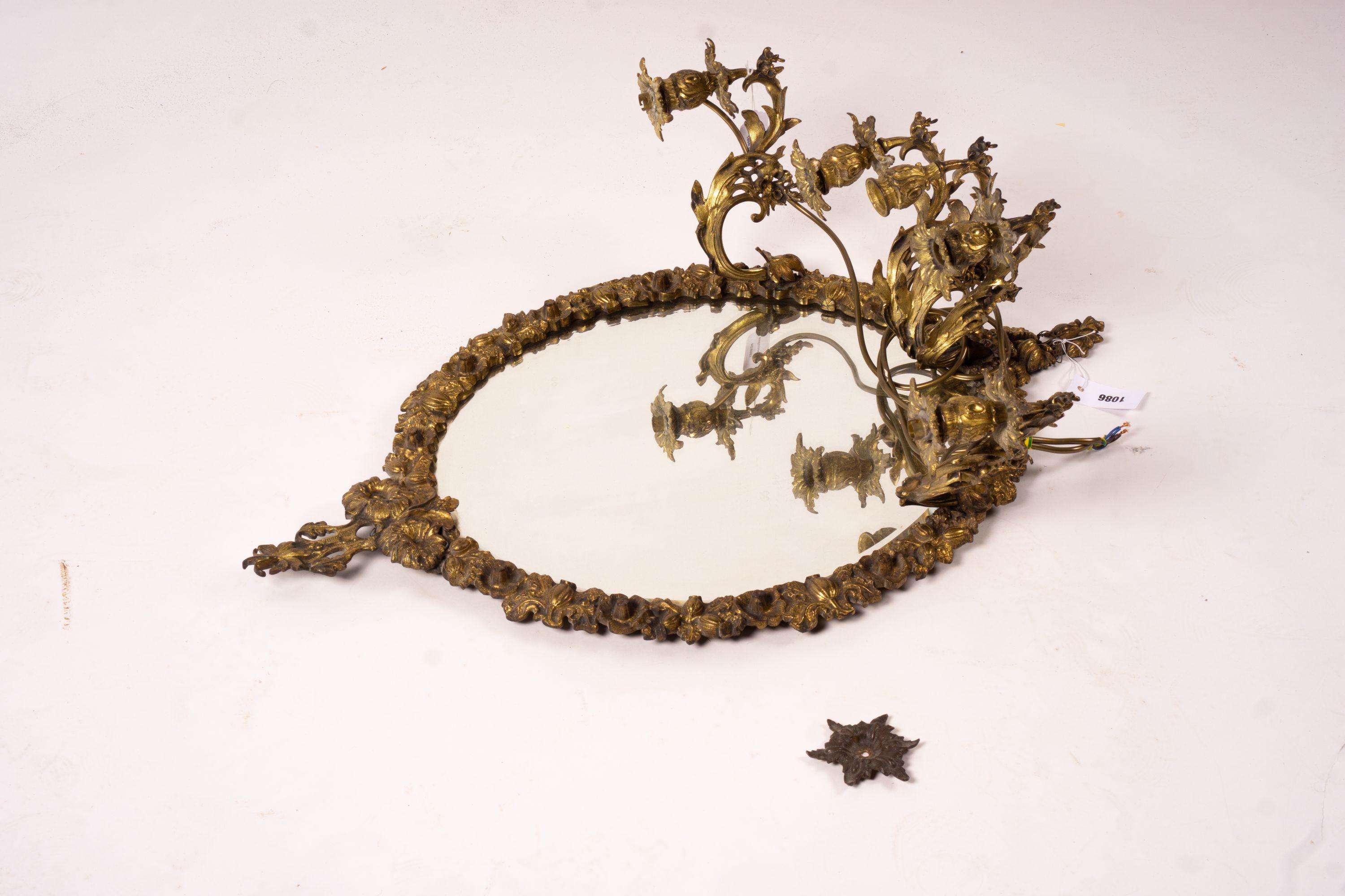 A late 19th century brass five branch girondole, width 64cm, height 84cm